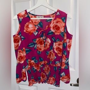 Woman’s long sleeve floral blouse
